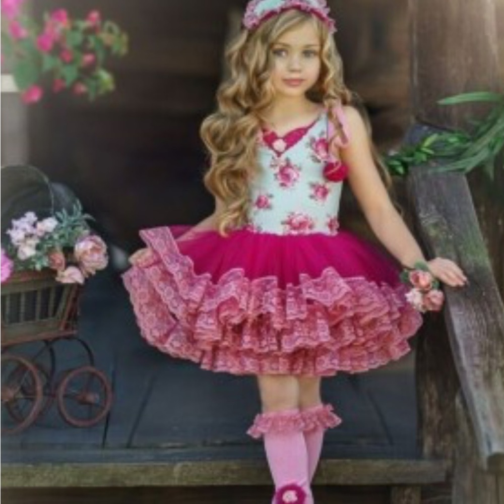 Dollcake dress comes in a bundle with matching footless socks and hairpiece